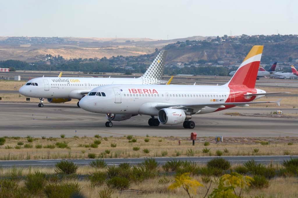 Aviones de las compañías Iberia y de Vueling, ambas del grupo IAG.